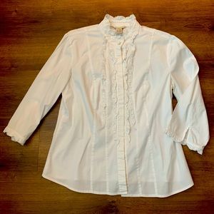 Women’s white button down with ruffle neck